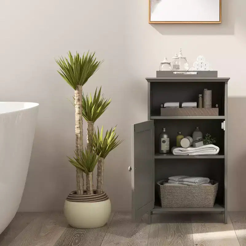 Meuble bas de salle de bain avec une porte et un compartiment ouvert